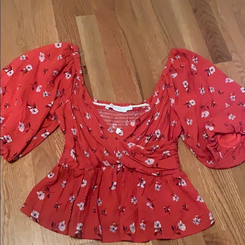 red floral shirt